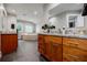 Spacious bathroom featuring dual vanities with granite counters and a luxurious soaking tub at 1510 Chevron Dr, Sandy Springs, GA 30350