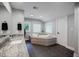 Bright bathroom with a corner soaking tub, granite counters, and stylish tile flooring at 1510 Chevron Dr, Sandy Springs, GA 30350