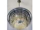 Close-up of a modern chandelier featuring thin metal rods suspended from the ceiling at 1510 Chevron Dr, Sandy Springs, GA 30350