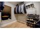 Well-organized closet space featuring hanging racks, shelves, and shoe storage at 1510 Chevron Dr, Sandy Springs, GA 30350