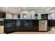 Close-up of the kitchen island featuring lots of storage and stainless steel appliances at 1510 Chevron Dr, Sandy Springs, GA 30350