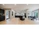 Spacious kitchen featuring dark cabinetry, stainless steel appliances, a kitchen island, and an eat-in area at 1510 Chevron Dr, Sandy Springs, GA 30350