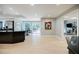 Bright, open-concept kitchen featuring a large island, stainless steel appliances, and sliding glass doors to the deck at 1510 Chevron Dr, Sandy Springs, GA 30350