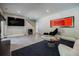 Bright living room with modern decor, tile flooring, and a view of the staircase at 1510 Chevron Dr, Sandy Springs, GA 30350