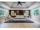 Spacious main bedroom with trey ceilings, stylish decor, and large windows at 1510 Chevron Dr, Sandy Springs, GA 30350