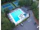 Aerial view of the community pool, tennis courts, and parking lot at 2953 Kings Walk Ave, Marietta, GA 30062