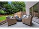 A stylish stone patio with a fire pit, ideal for outdoor entertaining at 2953 Kings Walk Ave, Marietta, GA 30062