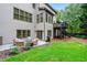 Backyard view with a walk out deck, patio and lawn, great for outdoor activities at 2953 Kings Walk Ave, Marietta, GA 30062