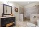 Elegant bathroom featuring a walk-in shower with tile, vanity with storage, and modern fixtures at 2953 Kings Walk Ave, Marietta, GA 30062
