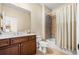 Well-maintained bathroom with a vanity, toilet, and shower-tub combination at 2953 Kings Walk Ave, Marietta, GA 30062