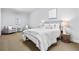 Serene bedroom featuring neutral tones, plush carpeting, and ample natural light at 2953 Kings Walk Ave, Marietta, GA 30062