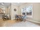 Bright breakfast nook features a round table with seating and natural light from the window at 2953 Kings Walk Ave, Marietta, GA 30062