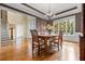 Elegant dining room featuring hardwood floors, large windows, and classic chandelier at 2953 Kings Walk Ave, Marietta, GA 30062