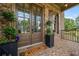 Elegant brick home exterior featuring double doors and beautiful landscaping at 2953 Kings Walk Ave, Marietta, GA 30062