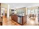 Gourmet kitchen featuring stainless steel appliances, large island, and an open concept layout at 2953 Kings Walk Ave, Marietta, GA 30062