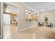 Open living area showcasing tile floors, a bar, and comfortable seating in neutral tones at 2953 Kings Walk Ave, Marietta, GA 30062