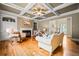 Comfortable living room features coffered ceilings, fireplace, hardwood floors, and custom built-ins at 2953 Kings Walk Ave, Marietta, GA 30062