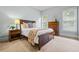 Cozy main bedroom features natural light, carpet, and classic furnishings creating a serene retreat at 2953 Kings Walk Ave, Marietta, GA 30062