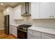 Well-equipped kitchen features stainless steel appliances, gas range, and white countertops for a modern cooking space at 387 Hillside Sw Dr, Atlanta, GA 30310