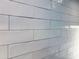 Close-up of a sleek subway tile backsplash, a modern design element adding texture to the kitchen at 387 Hillside Sw Dr, Atlanta, GA 30310