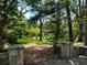 Park entrance with lush greenery and mature trees create a serene and inviting atmosphere at 387 Hillside Sw Dr, Atlanta, GA 30310