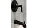 Close-up of shower fixtures in matte black, including a shower head and a tub spout, set against subway tile at 387 Hillside Sw Dr, Atlanta, GA 30310