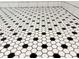 Shower floor features small white round tiling with black grout providing traction at 387 Hillside Sw Dr, Atlanta, GA 30310