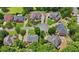 Aerial view of a cul-de-sac neighborhood with mature trees at 5009 Kingsley Manor Ct, Marietta, GA 30066