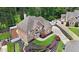 Luxury brick home with well-manicured lawn and garden at 5009 Kingsley Manor Ct, Marietta, GA 30066