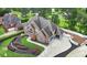 Beautiful home with a large yard, three-car garage, and well-maintained landscaping at 5009 Kingsley Manor Ct, Marietta, GA 30066