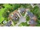 Overhead view of home with a pool, patio, and circular driveway at 5009 Kingsley Manor Ct, Marietta, GA 30066