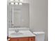 Bathroom featuring a single sink vanity and a toilet at 5009 Kingsley Manor Ct, Marietta, GA 30066