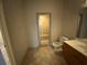 This bathroom features tile flooring, a shower stall, toilet, and vanity at 5009 Kingsley Manor Ct, Marietta, GA 30066