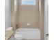 Bathroom with tile surround tub and granite countertop at 5009 Kingsley Manor Ct, Marietta, GA 30066