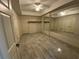 Bedroom with tile flooring, ceiling fan, closet, and wall mirror at 5009 Kingsley Manor Ct, Marietta, GA 30066