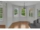 Breakfast nook features natural light and scenic views from windows surrounding the room at 5009 Kingsley Manor Ct, Marietta, GA 30066