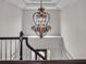 Elegant foyer featuring a decorative chandelier and a view to the front door at 5009 Kingsley Manor Ct, Marietta, GA 30066