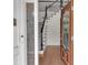 Foyer view highlighting the hardwood floor, decorative glass front door, and staircase at 5009 Kingsley Manor Ct, Marietta, GA 30066