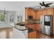 Spacious kitchen with wood cabinets, stainless steel appliances and granite countertops at 5009 Kingsley Manor Ct, Marietta, GA 30066