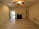 Living room featuring tile floors and a fireplace at 5009 Kingsley Manor Ct, Marietta, GA 30066