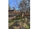 Wooden fence and rock drainage bed enhance the spacious backyard at 2807 Mcclave Dr, Doraville, GA 30340