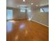 Spacious basement featuring wood floors, multiple windows and outside entrance at 2807 Mcclave Dr, Doraville, GA 30340