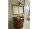 Bathroom showcases marble vanity, golden sink, and unique mirror at 2807 Mcclave Dr, Doraville, GA 30340