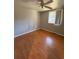 Bedroom featuring hardwood floors and a window at 2807 Mcclave Dr, Doraville, GA 30340