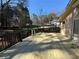 Spacious wooden deck offers a great outdoor living space and views of the backyard, perfect for entertaining or relaxing at 2807 Mcclave Dr, Doraville, GA 30340