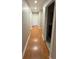 Hallway features hardwood floors and neutral paint at 2807 Mcclave Dr, Doraville, GA 30340