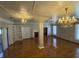 Bright living room with fireplace, built-in bookshelves, and hardwood floors at 2807 Mcclave Dr, Doraville, GA 30340