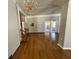 Large, inviting living room with hardwood floors and views to the outside at 2807 Mcclave Dr, Doraville, GA 30340