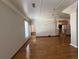 Spacious living room with gleaming hardwood floors and elegant chandelier at 2807 Mcclave Dr, Doraville, GA 30340