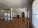 Expansive living room featuring hardwood floors, fireplace, and natural light at 2807 Mcclave Dr, Doraville, GA 30340